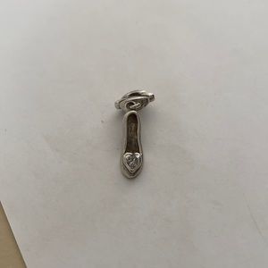 Cinderella’s slipper charm retired